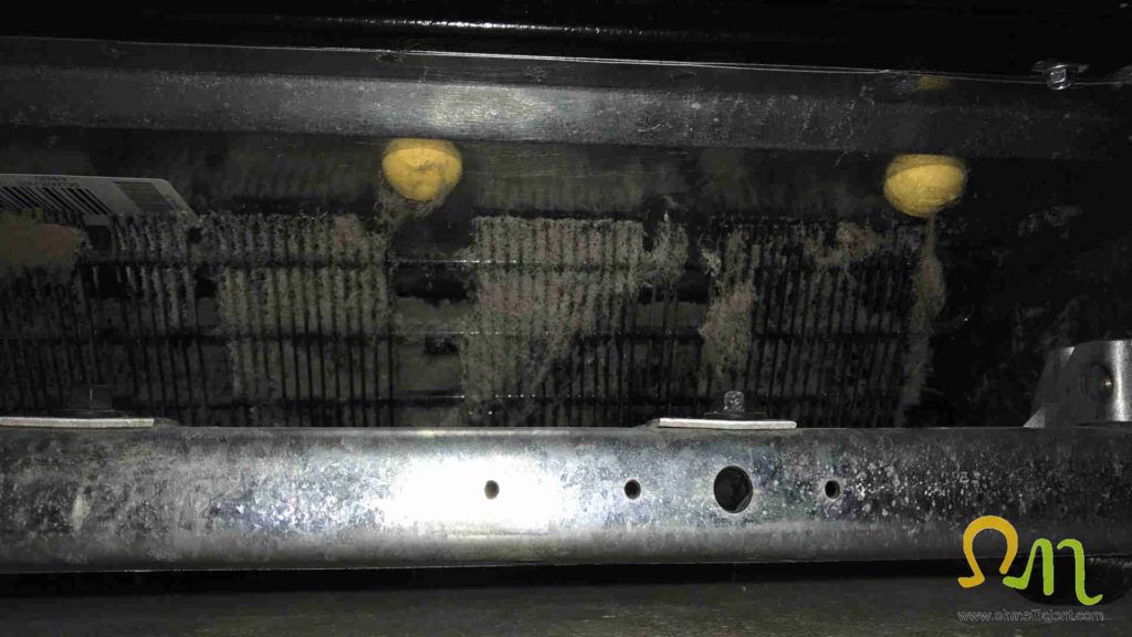 Refrigerator dirty condenser coil